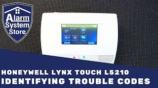 How To Clear Trouble Conditions On Honeywell Lynx L5210  AlarmSystemStore [upl. by Irem]