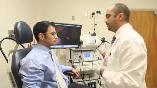 Laryngoscopy and stroboscope to examine the vocal cords [upl. by Geldens]