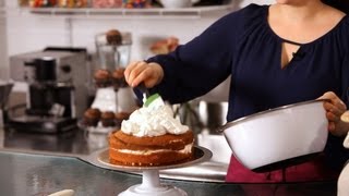 How to Ice a Cake with Whipped Cream  Cake Decorating [upl. by Nylatsyrk44]