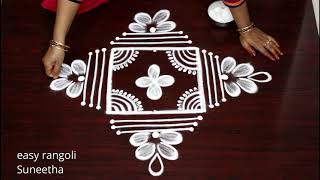 Creative 3x3 dots muggulu rangoli by Suneetha  Latest Lotus rangoli amp kolam designs [upl. by Ellehcar855]